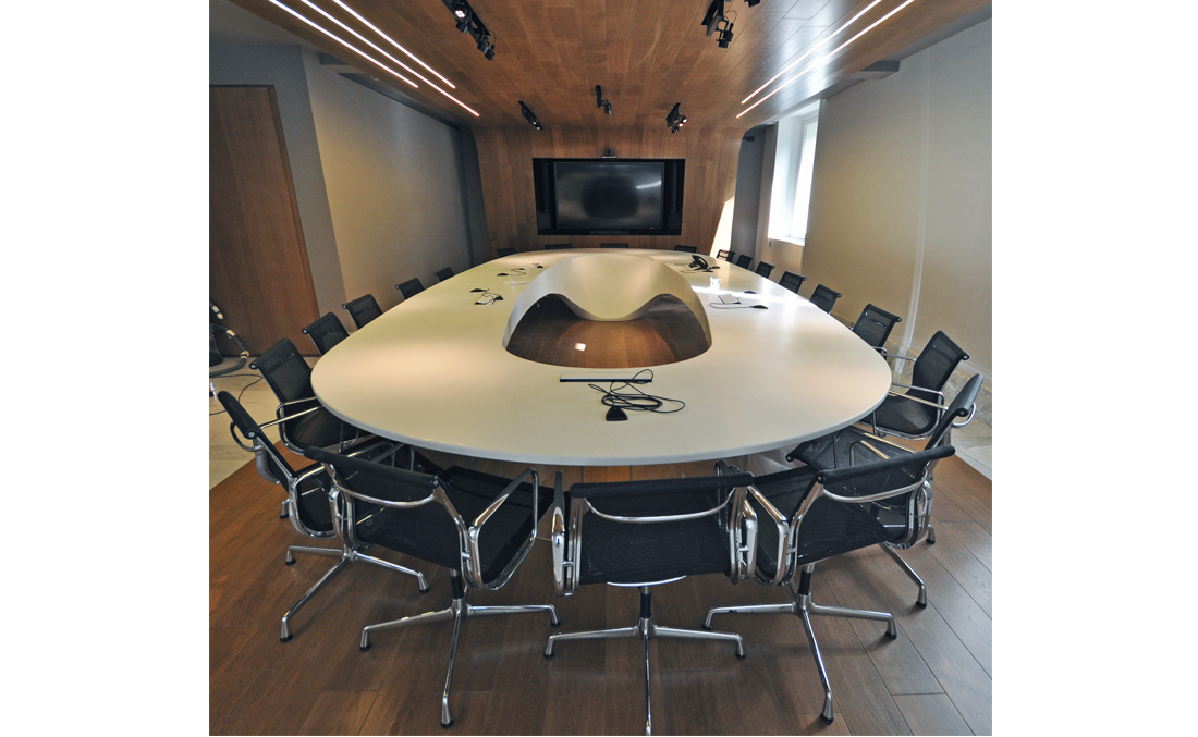 bespoke white meeting table in solid surface