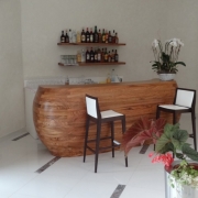 bar corner with double-curving wooden counter