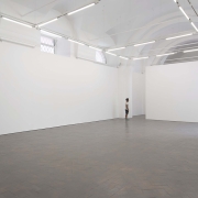 man in a wide white space