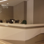 white and beige reception desk