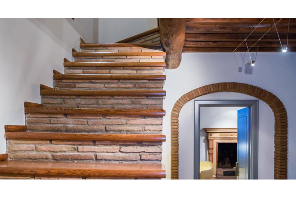brick and wood staircase