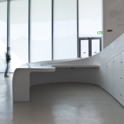 detail of double-curving desk in white gelcoat