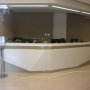 bespoke white and beige reception counter