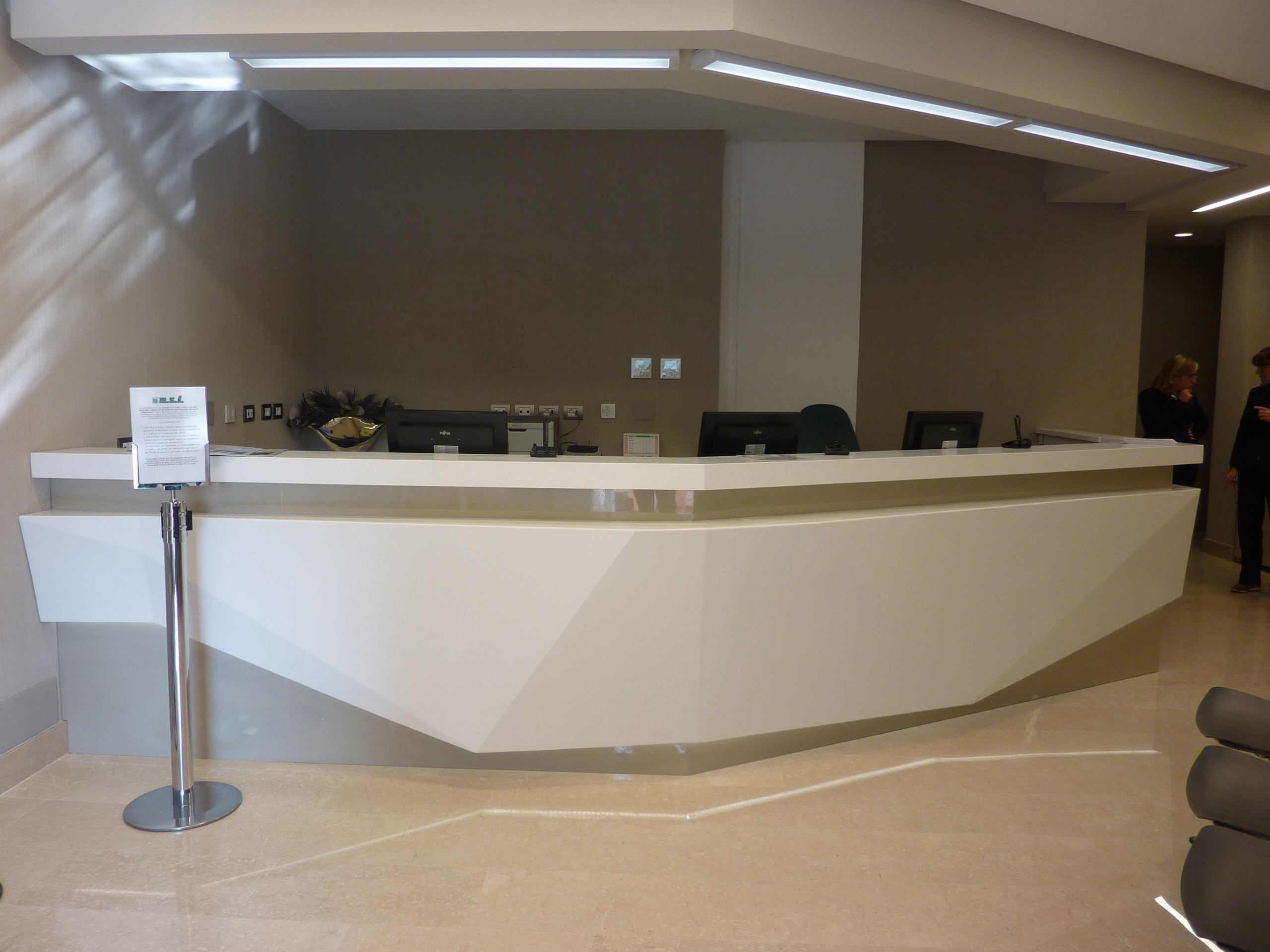 bespoke white and beige reception counter