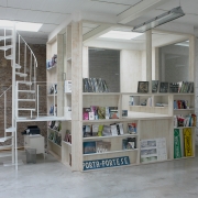 cubic bookcase in wood with books
