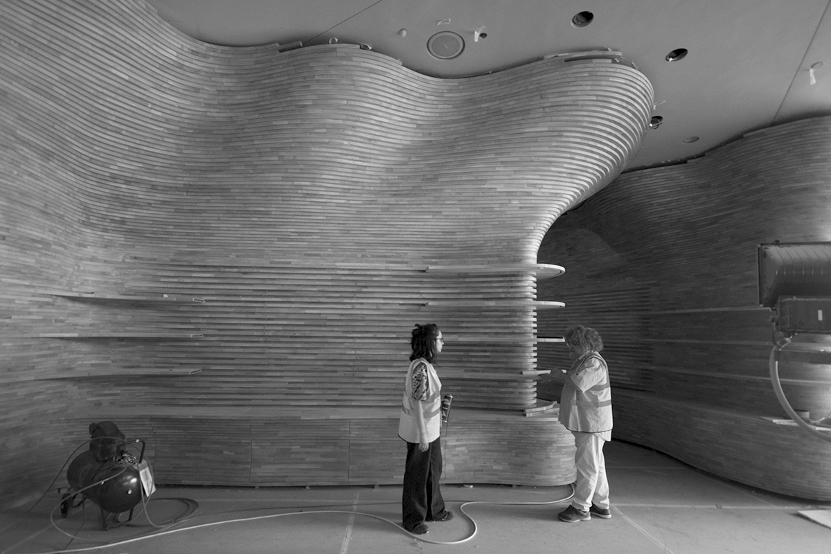 Installation of the wooden canyon or National museum of Qatar gift shop by Devoto Design