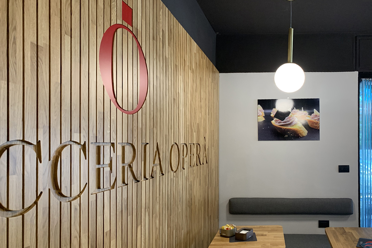 Detail of customized cladding of Opera bakery shop, designed and delivered by Devoto Design